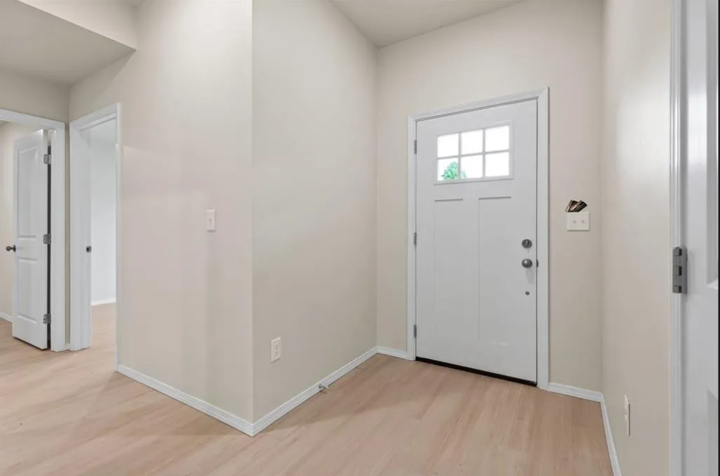 Entry and hallway of a new-construction Meadow Hills home